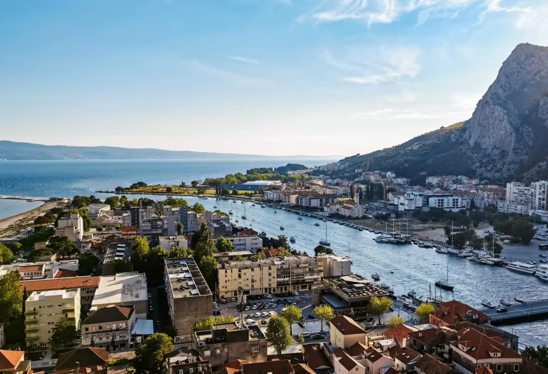 Beautiful view of a seaside town of Omis in Croatia. Beautiful blue adriatic sea coast in summer