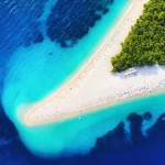 Croatia, Hvar island, Bol. Aerial view at the Zlatni Rat. Beach and sea from air. Famous place in Croatia. Summer seascape from drone. Travel - image